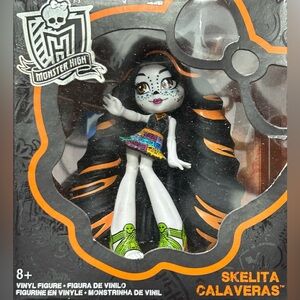 Monster High Skelita Calaveras Vinyl Figure with Black and Orange Hair